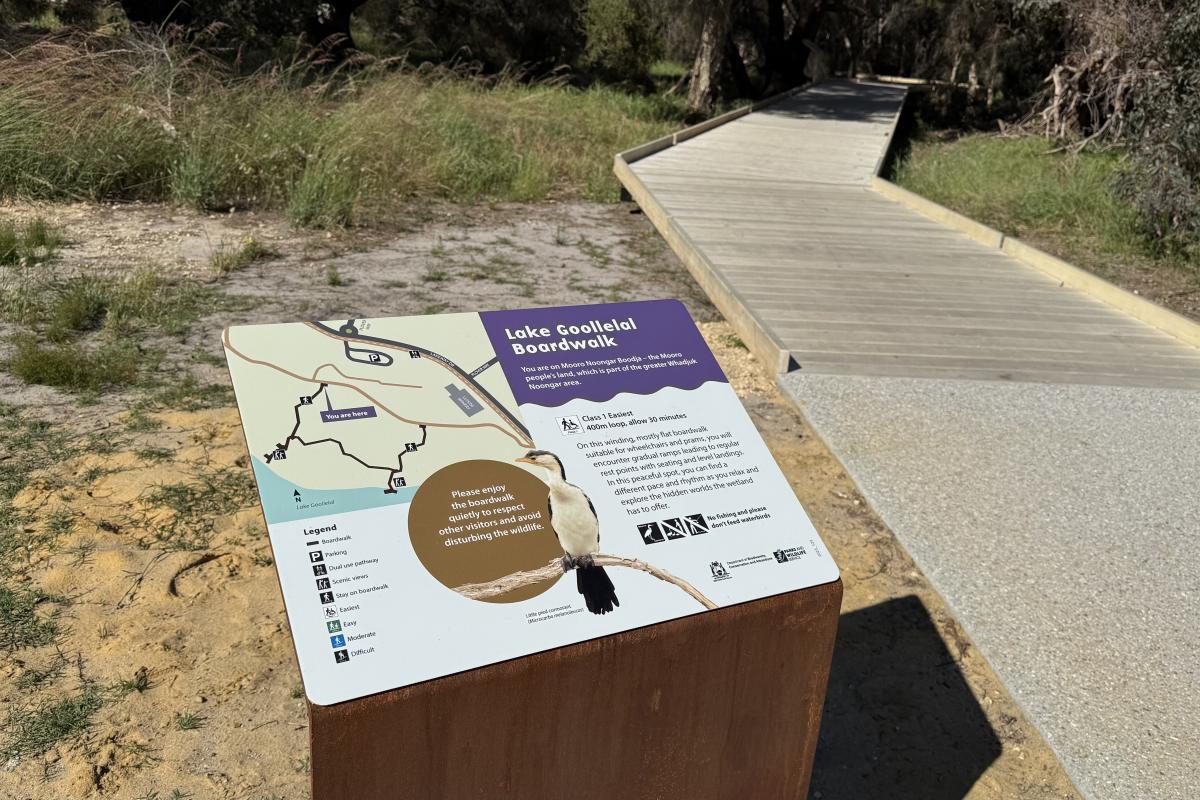 Sign with information about the area next to the boardwalk. 